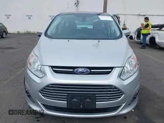 2014 Ford C-Max SEL z VIN 1FADP5BU7EL511677, wystawiony jako IAAI lot #40554962 z przebiegiem 63 031 mil mil oraz . Historia ofert i sprzedaży dostępna na DreamBid. Obrazek 11.