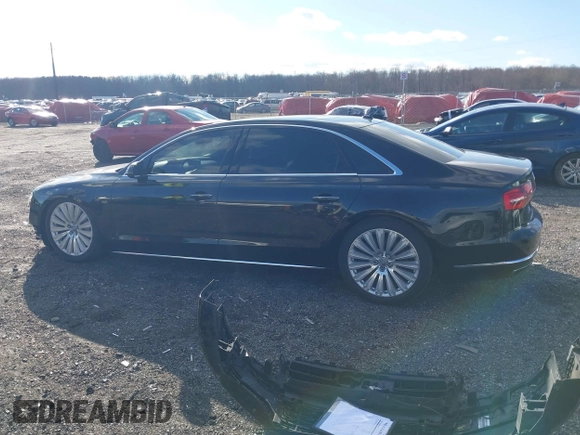 2015 Audi A8 L 4.0T with VIN WAU32AFD4FN014063, listed as a IAAI auction lot 41501970 with 158,570 mi miles. Bid and sale history available at carsss.com. Image 15.