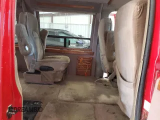 2000 Chevrolet Chevy Van z VIN 1GBFG15M4Y1211137, wystawiony jako Copart lot #75990404 z przebiegiem 137 181 mil mil oraz Nie do naprawy • Non repairable. Historia ofert i sprzedaży dostępna na DreamBid. Obrazek 11.