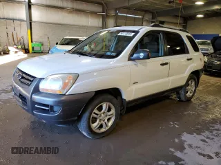 2005 Kia Sportage LX with VIN KNDJE723957069595, listed as a Copart auction lot 80123084 with Not Provided miles and Salvage Title. Bid and sale history available at carsss.com. Image 1.