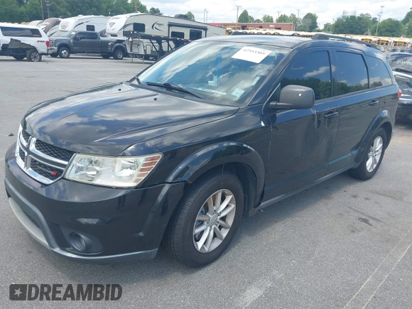 2013 Dodge Journey SXT with VIN 3C4PDCBG6DT501871, listed as a IAAI auction lot 42553305 with 184,226 mi miles and . Bid and sale history available at DreamBid. Image 2.