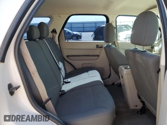 2012 Ford Escape XLS z VIN 1FMCU0C76CKB12316, wystawiony jako Copart lot #65011265 z przebiegiem 139 992 mil mil oraz Szkoda całkowita • Salvage title. Historia ofert i sprzedaży dostępna na DreamBid. Obrazek 11.