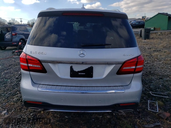 2017 Mercedes-Benz GLS 550 with VIN 4JGDF7DE0HA804282, listed as a Copart auction lot 82790194 with 62,409 mi miles and Salvage title. Bid and sale history available at DreamBid. Image 6.