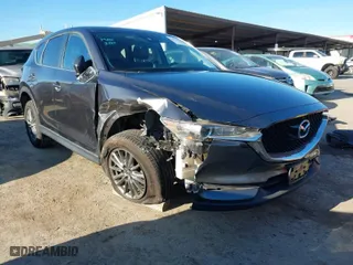 2017 Mazda CX-5 Touring with VIN JM3KFBCL2H0165625, listed as a IAAI auction lot 41879145 with 64,745 mi miles. Bid and sale history available at carsss.com. Image 1.