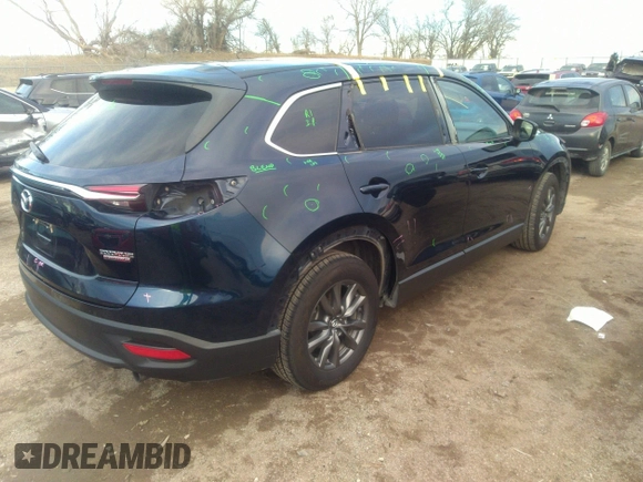 2021 Mazda CX-9 Sport with VIN JM3TCBBY4M0519407, listed as a IAAI auction lot 40883497 with 90,205 mi miles and . Bid and sale history available at carsss.com. Image 4.