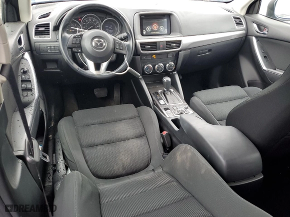 2016 Mazda CX-5 Touring with VIN JM3KE4CY4G0778032, listed as a Copart auction lot 52769065 with 81,443 mi miles and Salvage Title. Bid and sale history available at carsss.com. Image 8.