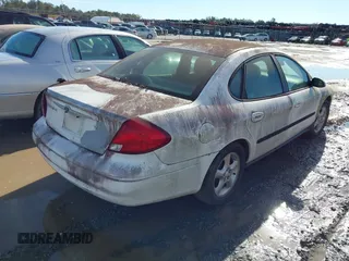 2000 Ford Taurus SE with VIN 1FAFP53U3YA244156, listed as a IAAI auction lot 41204116 with 125,694 mi miles and . Bid and sale history available at DreamBid. Image 4.