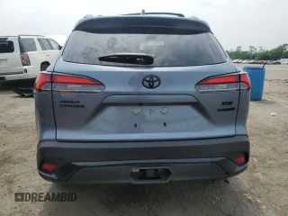 2024 Toyota Corolla Cross Hybrid S with VIN 7MUFBABG0RV053138, listed as a Copart auction lot 59515915 with 7,065 mi miles and Salvage title. Bid and sale history available at DreamBid. Image 6.