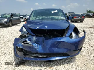 2024 Tesla Model Y Long Range with VIN 7SAYGAEE6RF196245, listed as a Copart auction lot 54667765 with 10,336 mi miles and Salvage title. Bid and sale history available at DreamBid. Image 5.