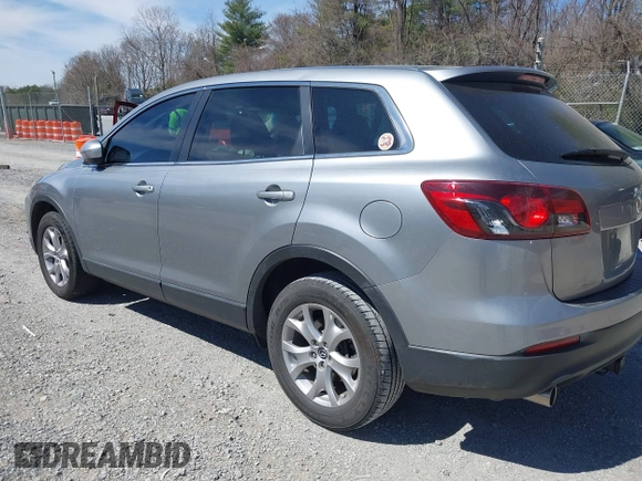 2015 Mazda CX-9 Sport with VIN JM3TB2BA7F0450544, listed as a IAAI auction lot 41812565 with 81,727 mi miles and . Bid and sale history available at carsss.com. Image 3.
