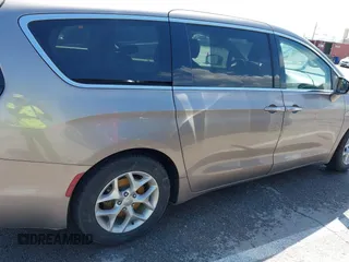 2018 Chrysler Pacifica Touring Plus with VIN 2C4RC1FG4JR306554, listed as a IAAI auction lot 41984255 with 107,109 mi miles and . Bid and sale history available at DreamBid. Image 12.
