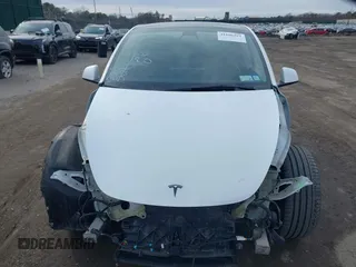 2021 Tesla Model Y Performance with VIN 5YJYGDEF1MF262930, listed as a IAAI auction lot 41606321 with 28,882 mi miles and . Bid and sale history available at DreamBid. Image 6.