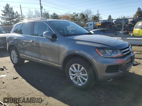 2012 Volkswagen Touareg Lux z VIN WVGEK9BPXCD011322, wystawiony jako Copart lot #87062254 z przebiegiem 110 985 mil mil oraz Szkoda całkowita • Salvage title. Historia ofert i sprzedaży dostępna na DreamBid. Obrazek 4.