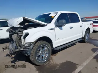 2015 Ford F-150 XLT with VIN 1FTEW1EP0FKE42273, listed as a IAAI auction lot 41988265 with 119,483 mi miles. Bid and sale history available at carsss.com. Image 2.