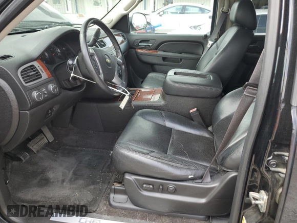 2014 Chevrolet Tahoe LTZ with VIN 1GNSKCE0XER228028, listed as a Copart auction lot 56971135 with 155,285 mi miles and Salvage title. Bid and sale history available at DreamBid. Image 7.