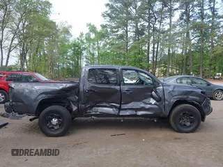 2022 Toyota Tacoma SR with VIN 3TYAX5GN1NT042099, listed as a IAAI auction lot 42081791 with 38,621 mi miles and . Bid and sale history available at DreamBid. Image 14.