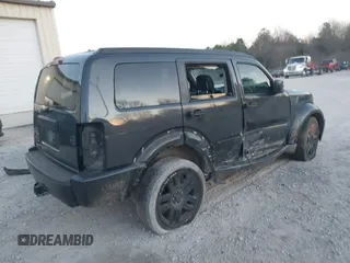2010 Dodge Nitro SE with VIN 1D4PT2GK3AW137797, listed as a IAAI auction lot 41689701 with 182,452 mi miles. Bid and sale history available at carsss.com. Image 4.