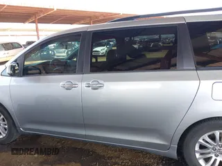 2016 Toyota Sienna XLE with VIN 5TDYK3DCXGS751231, listed as a IAAI auction lot 41975167 with 135,266 mi miles. Bid and sale history available at carsss.com. Image 14.