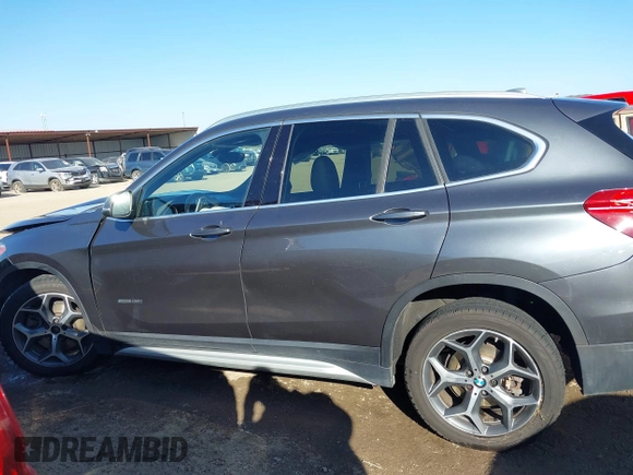 2017 BMW X1 sDrive28i with VIN WBXHU7C30H5H32753, listed as a IAAI auction lot 41441791 with 100,072 mi miles. Bid and sale history available at carsss.com. Image 15.
