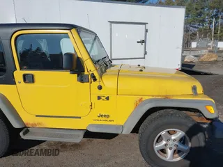 2005 Jeep Wrangler X with VIN 1J4FA39S25P374373, listed as a IAAI auction lot 41754017 with 195,156 mi miles. Bid and sale history available at carsss.com. Image 19.