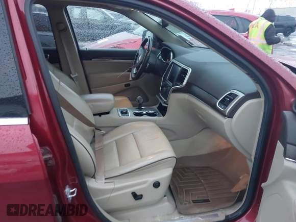2014 Jeep Grand Cherokee Overland with VIN 1C4RJFCG9EC299235, listed as a IAAI auction lot 41670065 with 108,589 mi miles and . Bid and sale history available at DreamBid. Image 5.