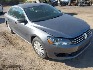 2014 Volkswagen Passat Wolfsburg Ed with VIN 1VWAS7A35EC037869, listed as a IAAI auction lot 41788561 with 157,443 mi miles. Bid and sale history available at carsss.com. Image 1.
