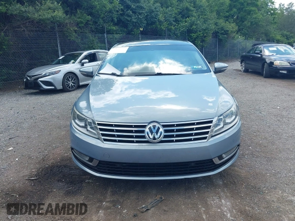 2013 Volkswagen CC Executive z VIN WVWGU7AN3DE524175, wystawiony jako IAAI lot #42401952 z przebiegiem 165 023 mil mil oraz . Historia ofert i sprzedaży dostępna na DreamBid. Obrazek 6.