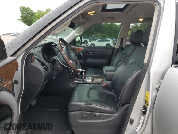 2016 Infiniti QX80 with VIN JN8AZ2NF5G9613664, listed as a Copart auction lot 56059585 with 152,309 mi miles and Salvage title. Bid and sale history available at DreamBid. Image 7.