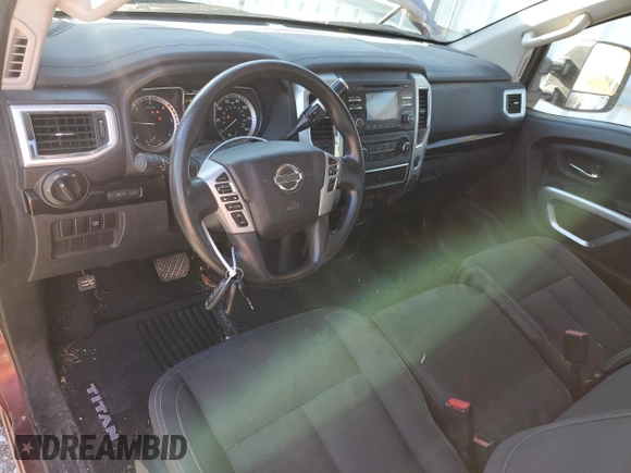 2017 Nissan Titan with VIN 1N6BA1R97HN520169, listed as a Copart auction lot 82783774 with 203,684 mi miles and Salvage title. Bid and sale history available at DreamBid. Image 8.