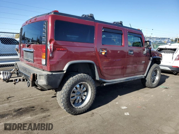2003 Hummer H2 with VIN 5GRGN23U93H149294, listed as a Copart auction lot 80242304 with 199,675 mi miles and Salvage Title. Bid and sale history available at carsss.com. Image 3.