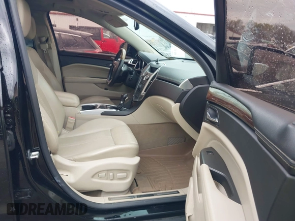 2012 Cadillac SRX Performance Collection with VIN 3GYFNBE39CS556339, listed as a IAAI auction lot 41838058 with 182,244 mi miles and . Bid and sale history available at DreamBid. Image 5.