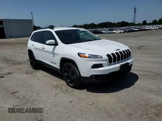 2016 Jeep Cherokee Altitude with VIN 1C4PJLCB8GW207480, listed as a Copart auction lot 62026585 with 124,229 mi miles and Salvage title. Bid and sale history available at DreamBid. Image 14.