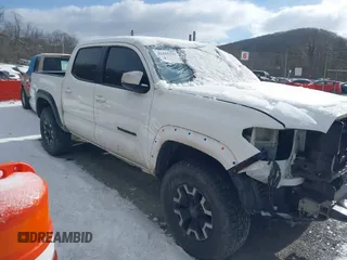 2019 Toyota Tacoma SR z VIN 5TFCZ5AN9KX178090, wystawiony jako IAAI lot #41155337 z przebiegiem 115 265 mil mil oraz . Historia ofert i sprzedaży dostępna na DreamBid. Obrazek 1.