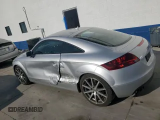 2009 Audi TT z VIN TRUKF38J391020407, wystawiony jako Copart lot #62101664 z przebiegiem 91 585 mil mil oraz Szkoda całkowita • Salvage title. Historia ofert i sprzedaży dostępna na DreamBid. Obrazek 2.