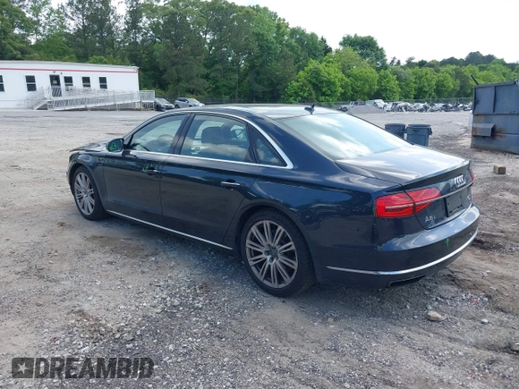 2015 Audi A8 4.0T with VIN WAU32AFD4FN002477, listed as a IAAI auction lot 42157514 with 151,729 mi miles and . Bid and sale history available at DreamBid. Image 3.