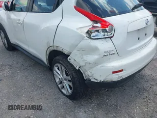 2013 Nissan Juke S with VIN JN8AF5MR2DT205370, listed as a IAAI auction lot 42055335 with 115,390 mi miles. Bid and sale history available at carsss.com. Image 6.