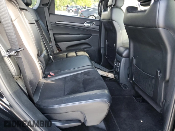 2018 Jeep Grand Cherokee Laredo E with VIN 1C4RJEAGXJC246874, listed as a Copart auction lot 56722005 with 101,493 mi miles and Salvage title. Bid and sale history available at DreamBid. Image 11.
