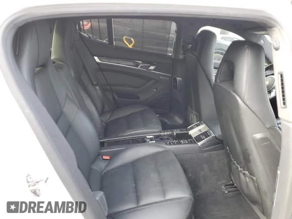 2014 Porsche Panamera S E-Hybrid z VIN WP0AD2A77EL044874, wystawiony jako Copart lot #80657424 z przebiegiem 73 809 mil mil oraz Szkody całkowita. Historia ofert i sprzedaży dostępna na DreamBid. Obrazek 10.