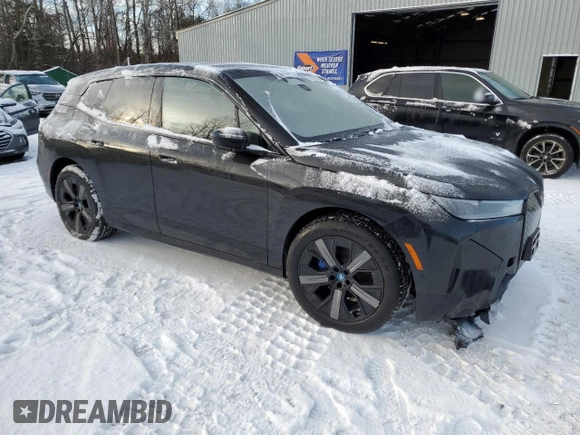 2025 BMW iX xDrive50 with VIN WB523CF04SCT20220, listed as a Copart auction lot 83225094 with 0 mi miles and Salvage Title. Bid and sale history available at carsss.com. Image 4.