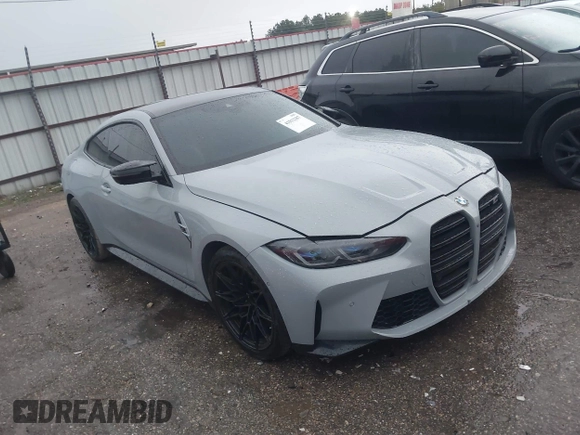 2021 BMW M4 Competition z VIN WBS33AZ03MCG59977, wystawiony jako IAAI lot #41012387 z przebiegiem 50 572 mil mil oraz . Historia ofert i sprzedaży dostępna na DreamBid. Obrazek 1.