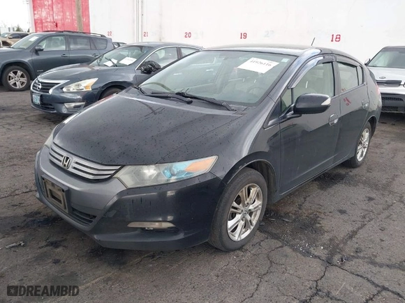 2010 Honda Insight EX with VIN JHMZE2H7XAS040192, listed as a IAAI auction lot 41926116 with 384,045 mi miles. Bid and sale history available at carsss.com. Image 2.