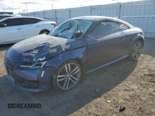 2016 Audi TT 2.0T z VIN TRUC5AFV9G1000774, wystawiony jako Copart lot #82791084 z przebiegiem 99 242 mil mil oraz Szkody całkowita. Historia ofert i sprzedaży dostępna na DreamBid. Obrazek 1.