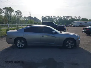 2014 Dodge Charger SE with VIN 2C3CDXBGXEH284832, listed as a IAAI auction lot 42069294 with 186,273 mi miles and . Bid and sale history available at carsss.com. Image 13.