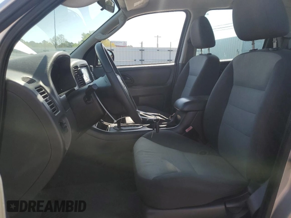 2007 Ford Escape XLS с VIN 1FMYU02Z77KB19323, выставлен на аукционе Copart как лот 52345655 с пробегом 153 509 миль миль и Списание • Salvage title. История ставок и продаж доступна на DreamBid. Изображение 7.