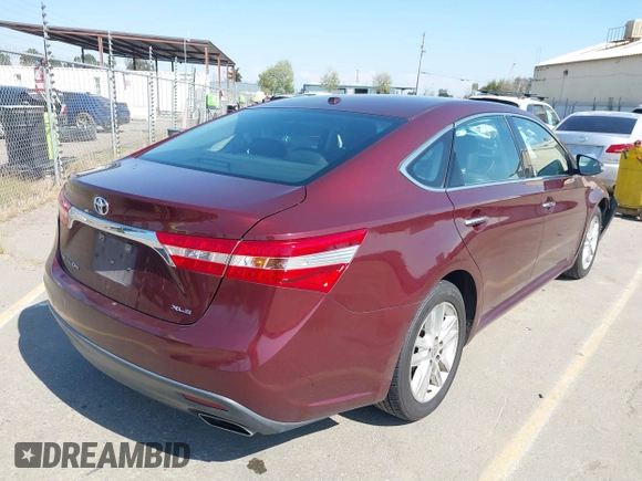 2015 Toyota Avalon Limited with VIN 4T1BK1EB6FU164272, listed as a IAAI auction lot 41891894 with 207,847 mi miles and . Bid and sale history available at DreamBid. Image 4.