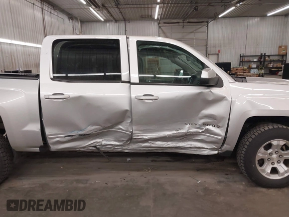 2017 Chevrolet Silverado 1500 LT with VIN 3GCUKREC5HG318772, listed as a IAAI auction lot 42056116 with 82,987 mi miles and . Bid and sale history available at DreamBid. Image 6.