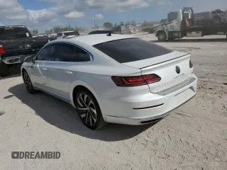2022 Volkswagen Arteon SEL R-Line z VIN WVWAR7AN5NE011955, wystawiony jako Copart lot #39277083 z przebiegiem 2808 mil mil oraz . Historia ofert i sprzedaży dostępna na DreamBid. Obrazek 2.