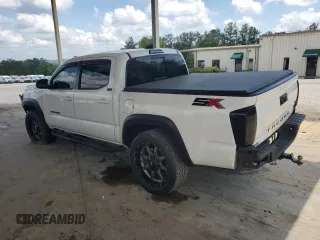 2023 Toyota Tacoma SR5 z VIN 3TMAZ5CN2PM202747, wystawiony jako Copart lot #51661755 z przebiegiem 79 216 mil mil oraz Czysty tytuł • Clean title. Historia ofert i sprzedaży dostępna na DreamBid. Obrazek 2.