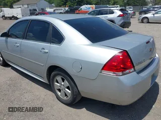 2011 Chevrolet Impala LT Fleet with VIN 2G1WG5EKXB1140232, listed as a IAAI auction lot 42480619 with 105,669 mi miles and . Bid and sale history available at DreamBid. Image 3.