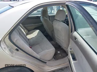 2003 Toyota Camry LE with VIN 4T1BE32K13U243738, listed as a IAAI auction lot 42120647 with Not Provided miles and . Bid and sale history available at DreamBid. Image 8.